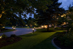paver driveway-in ground landscape lighting-dusk-mansion