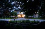 paver driveway-in ground landscape lighting-dusk-mansion